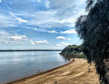 Scenic view of beach against sky