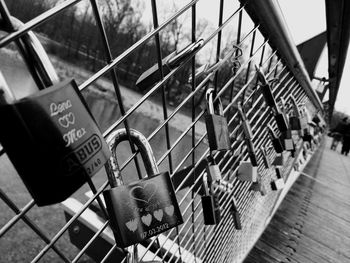 Love locks on railing on footbridge