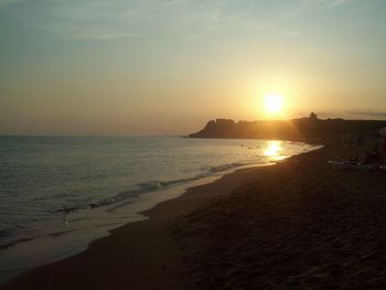 Scenic view of beach during sunset