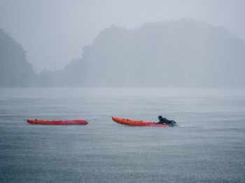 People on boat in sea