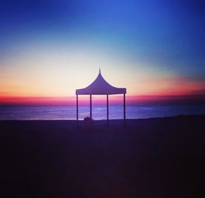 Scenic view of sea at sunset