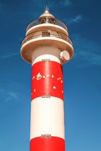 Low angle view of lighthouse against sky