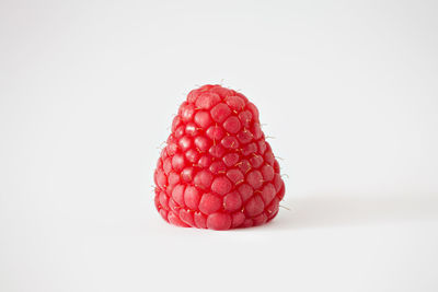 Close-up of strawberry against white background