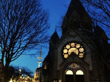 Low angle view of church against blue sky