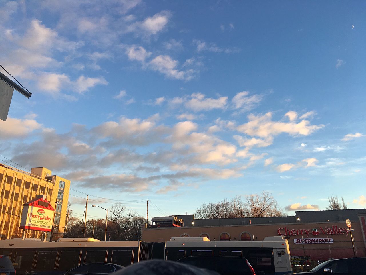 sky, cloud - sky, mode of transport, car, transportation, city, building exterior, outdoors, no people, architecture, day