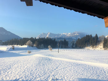 The wild emperor with his crown in the evening, view from the village kössen in austria tyrol