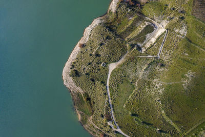 Aerial view of seascape by land