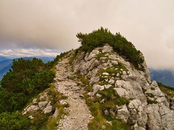 Rock formations on mountain against sky