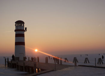 Scenic view of sea against sky at sunset