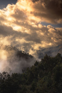 Scenic view of mountains against sky during sunset