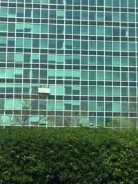 Building against sky seen through glass window