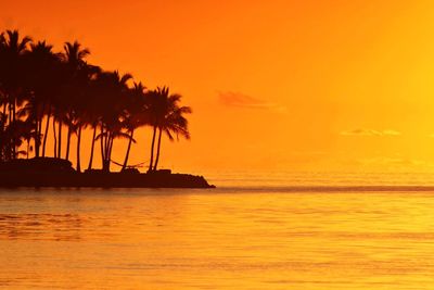 Scenic view of sea at sunset