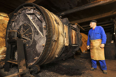 Mature man working in workshop