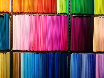 Full frame image of colorful textiles at rack