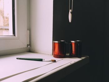 Close-up of open book on table at home