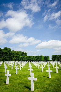 White cemetery against sky