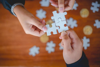 High angle view of man holding hands