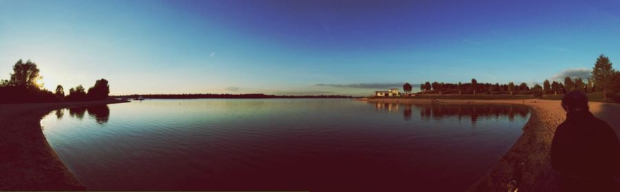 Scenic view of calm sea at sunset