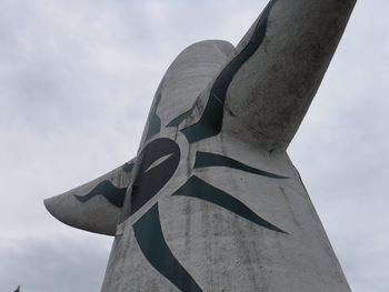 Low angle view of statue against sky