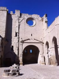 Exterior of historic building against clear sky