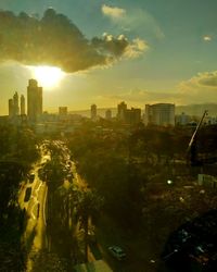 High angle view of buildings against sky during sunset