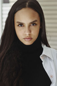 Close-up portrait of beautiful young woman