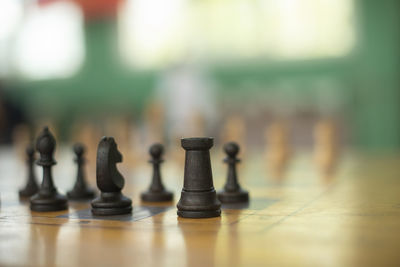 Close-up of chess pieces on board