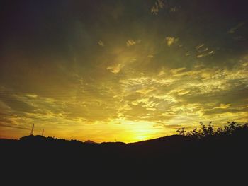 Scenic view of silhouette landscape against sky during sunset