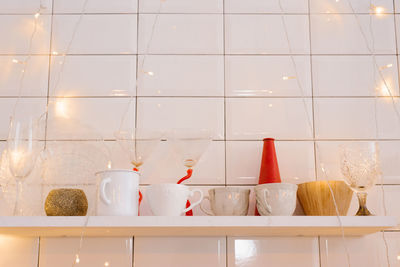 Light kitchen interior with red decor and christmas tree decorations. cooking a festive dinner 