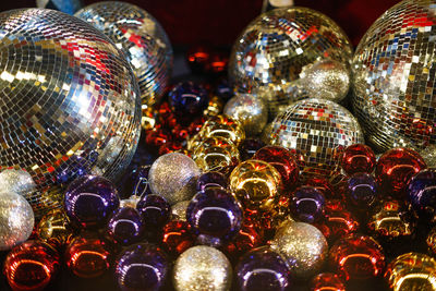 Close-up of christmas baubles and disco balls