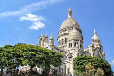 Low angle view of basilique du sacre coeur against sky