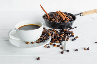 High angle view of coffee cups on table