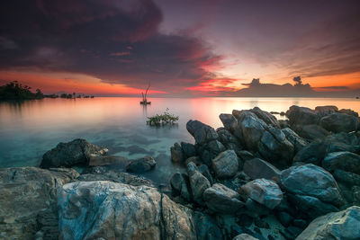 Scenic view of sea against sky during sunset