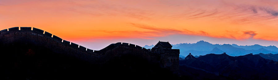 Low angle view of fort against sky during sunset