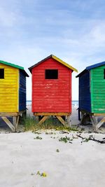 Abandoned wooden beach huts.  muizenberg. south africa.