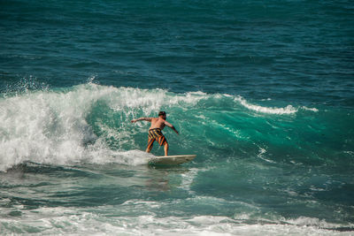 Man surfing in sea