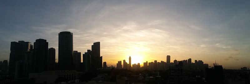 View of cityscape against sky during sunset