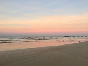 Scenic view of calm sea at sunset