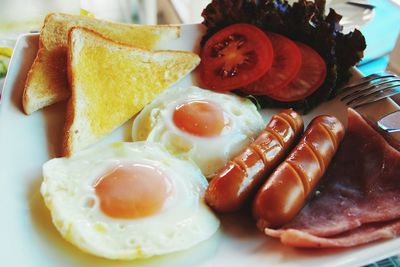 Close-up of breakfast served on table