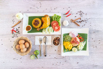 High angle view of fruits in plate on table