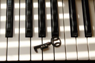 High angle view of key on piano at home