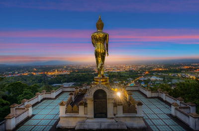 Wat phrathat khao noi with sunrise and the mist. view of nan province, thailand