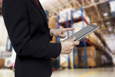 Close-up of man using mobile phone