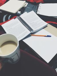 High angle view of coffee cup on table