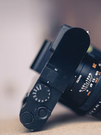 Close-up of camera on table