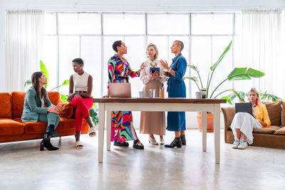 Group of business colleagues working in office