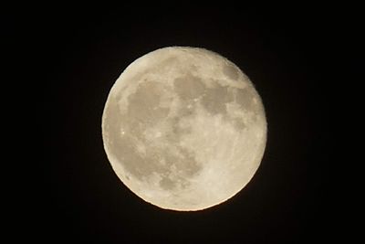 Scenic view of moon against sky at night