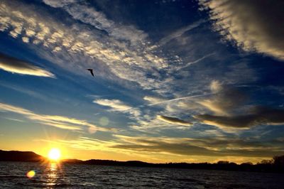 Sun shining through clouds