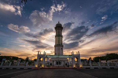 View of building against cloudy sky