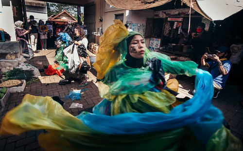 Group of people dancing in shop